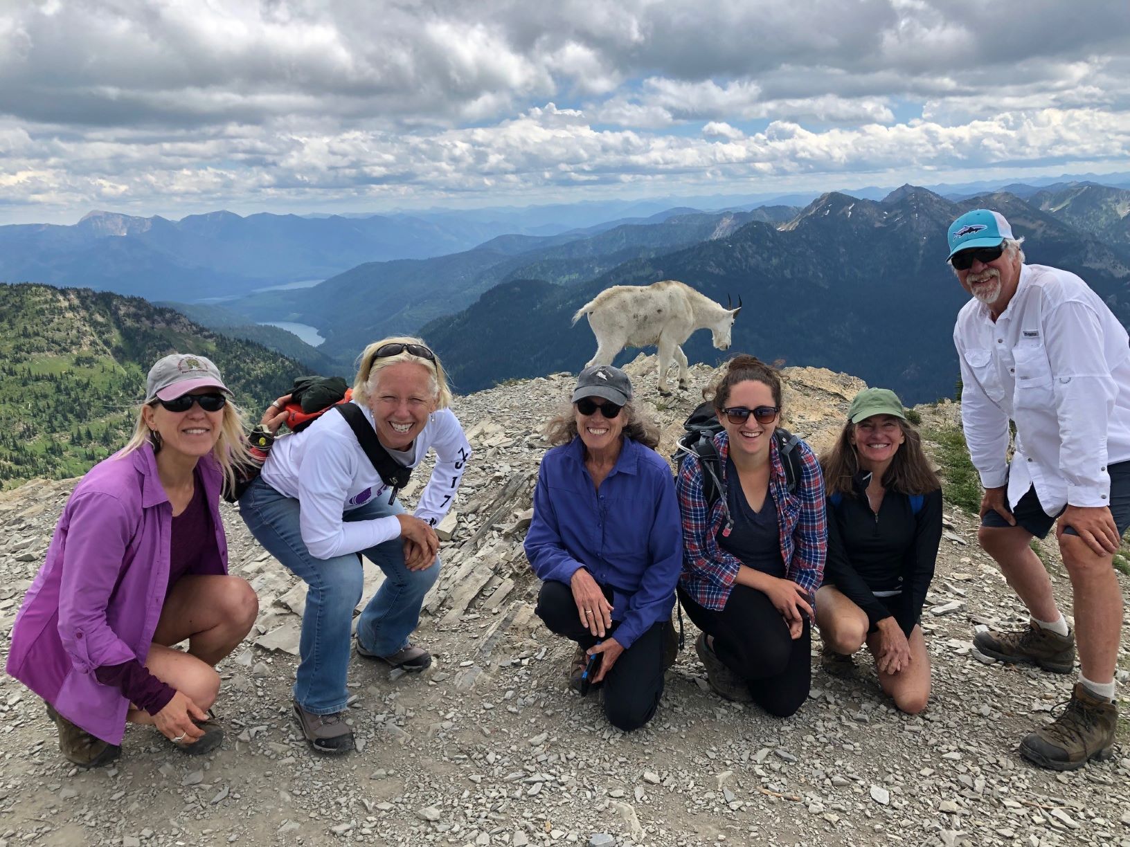 Hikers with Mountain Goat on Mt. Aeneas